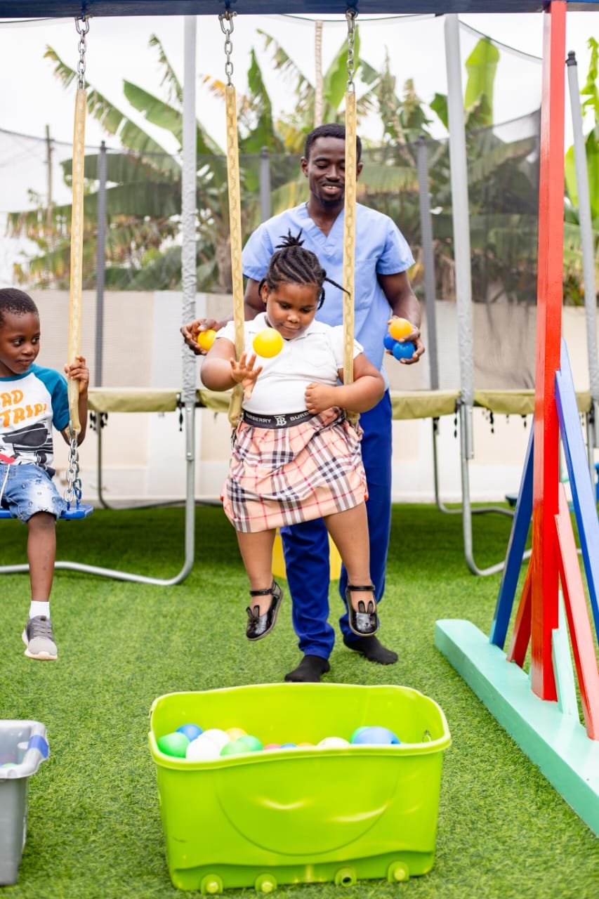 Children at a playground in Ghana