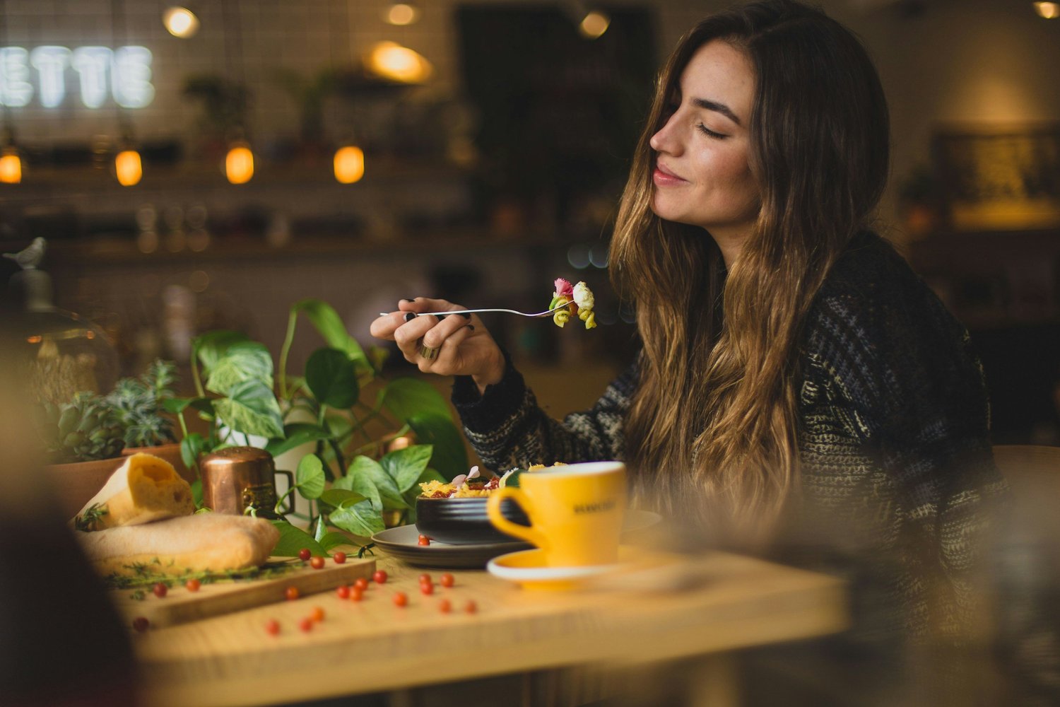 Woman eating trying to take care of her hormone balance